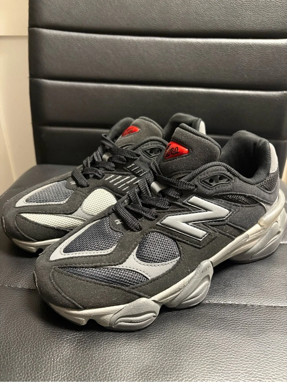New Balance Kids Black and Gray Athletic Sneakers with Red Logo Accent